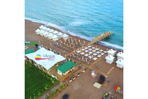 Antalya L'arena Beach'te 2 Kişilik Plaj Kullanımı & 2 Adet Soft İçecek